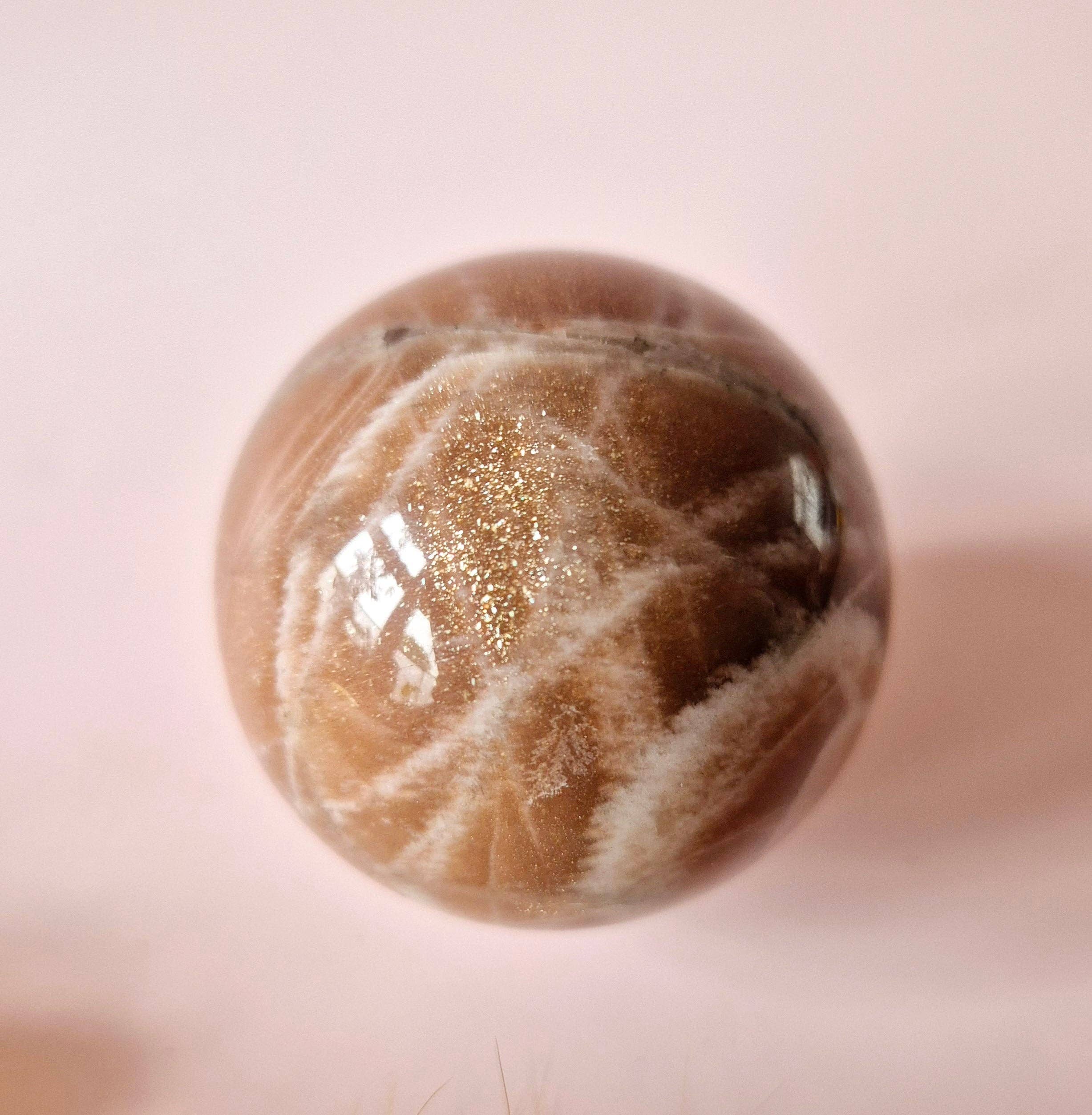 Moonlight Gemstones - Wholesale Spiritual Stone/Crystal - Crystal Gemstone Golden Sunstone Sphere with Blue & Gold Flash | 45–63 mm sphere2