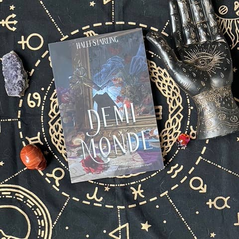 SIGNED paperback copy of Demimonde for wholesale by Halli Starling Books