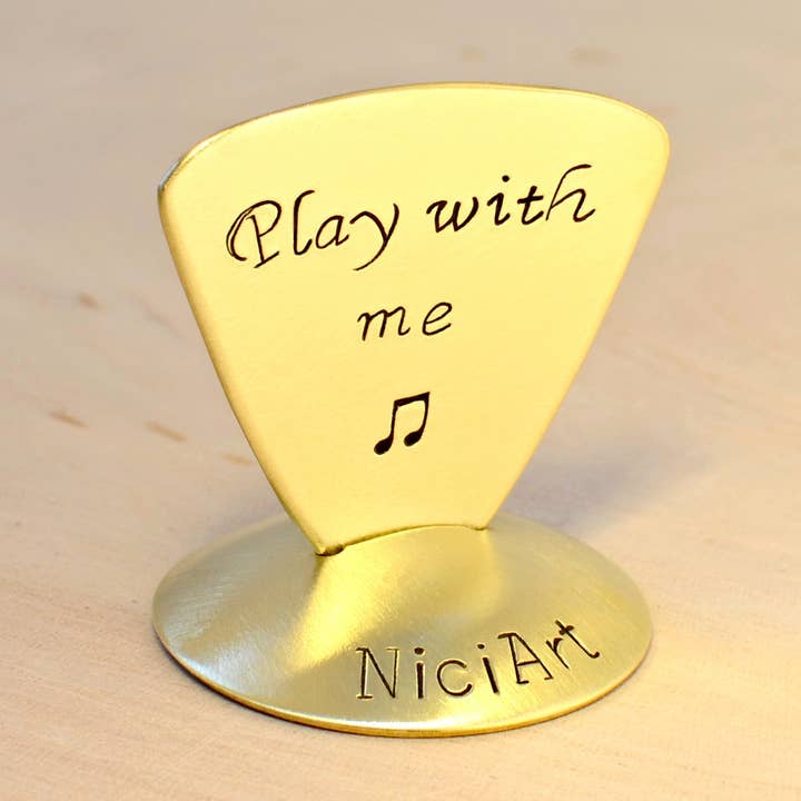 Play with Me Brass Triangular Guitar Pick for the Flirtatious Bassist for wholesale by NiciArt LLC