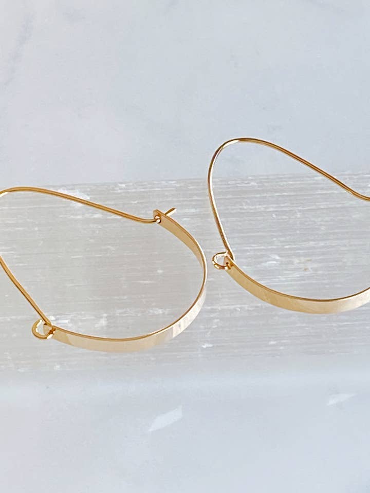Sleek swing hoops for wholesale by Bonnie Boardman Jewelry
