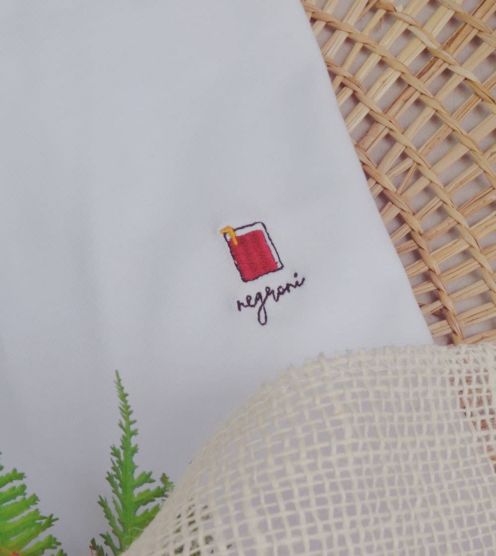 White Embroidered T-shirt - Negroni Cocktail for wholesale on Faire
