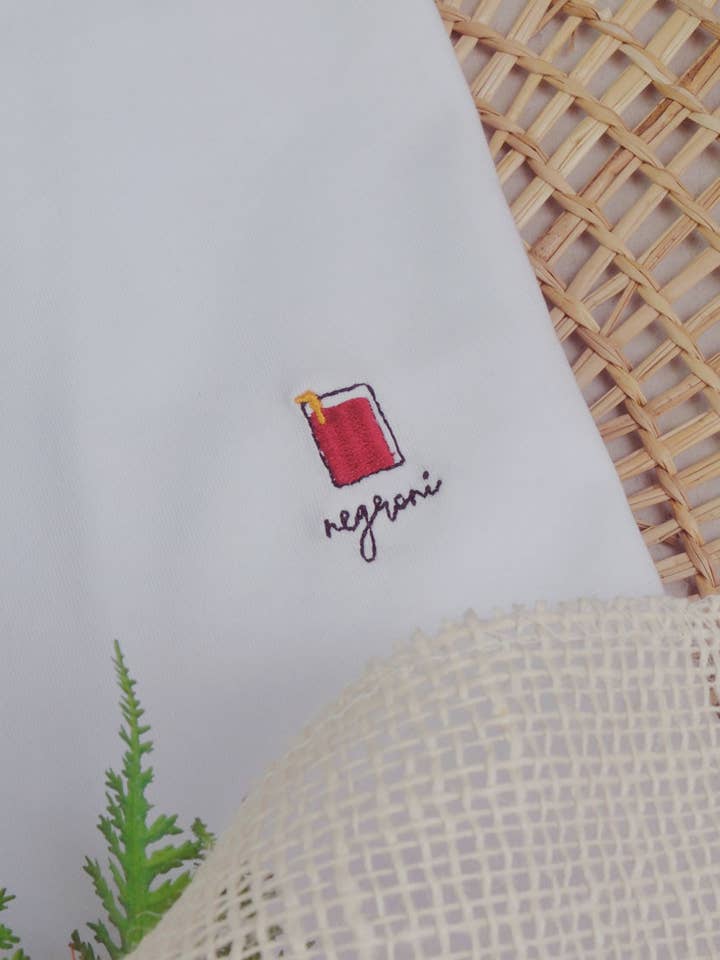White Embroidered T-shirt - Negroni Cocktail for wholesale on Faire0