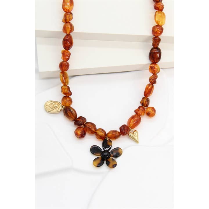 BELLISSIMA BIJOUX - Wholesale Pendant/Charm Necklace - Brown Resin Flower Necklace – Natural Charm and Bohemian Spirit1