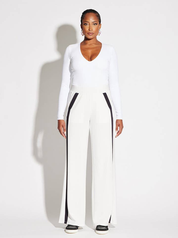 Pantalon de survêtement rayé pour la vente par CIRCULAR PATH