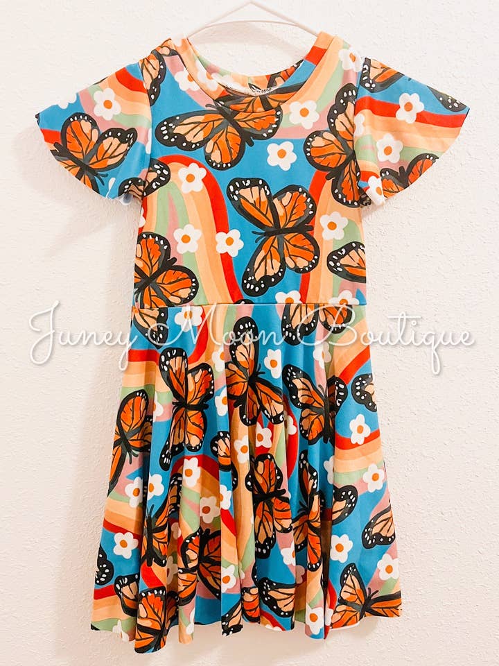 Boho Butterfly Peplum Dress for wholesale by Juney Moon Boutique, LLC