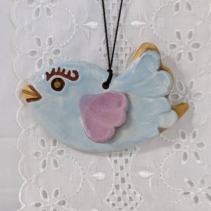 Handmade ceramic light blue sweet bird ornament for wholesale by CurlyFernCeramics