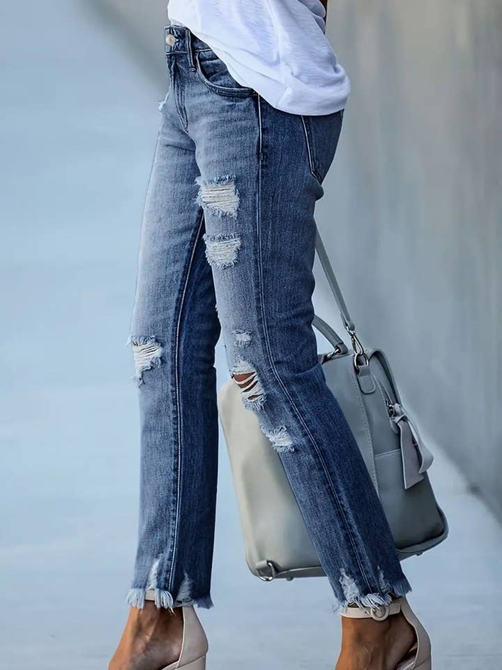 Medium Distressed Raw Hem Jeans with Pockets for wholesale on Faire