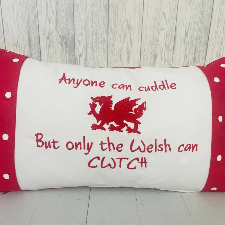Anyone can Cuddle but only the Welsh can Cwtch-Welsh dragon panel long cushion for wholesale by Lizzie Dixon Designs