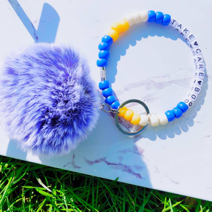 Ta hand om Boo KeyChain Wristlet för wholesale av Girl And Goals