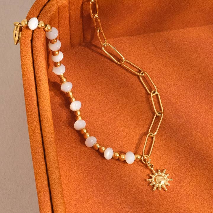 Sapin 18K Gold Non-Tarnish Sun and Pearl Chain Bracelet and other Purchase Wholesale mr003. Free Returns & Net 60 Terms on Faire trending on Faire.