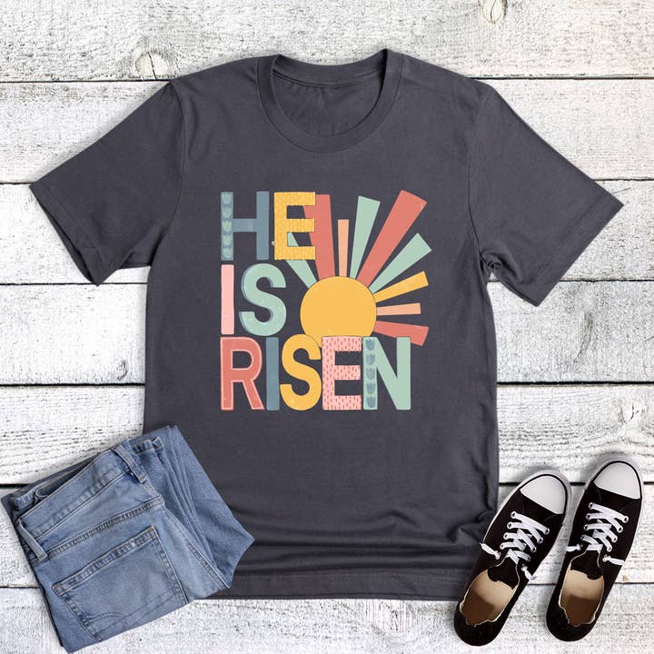 Easter Faith Pastel He Is Risen Graphic Tee for wholesale by Dust and Roots