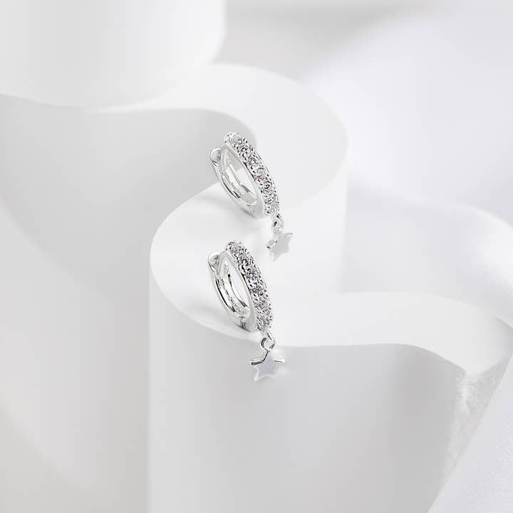 Falling Star Pave Silver 7mm Baby Huggie Earrings for wholesale by Wanderlust + Co
