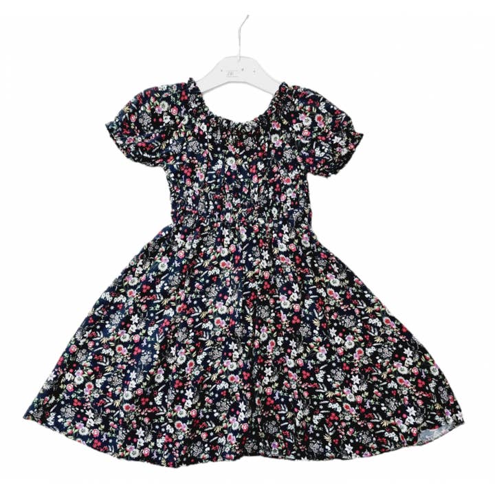 Girl's dress 4-14 years in black floral viscose pattern for wholesale by red white
