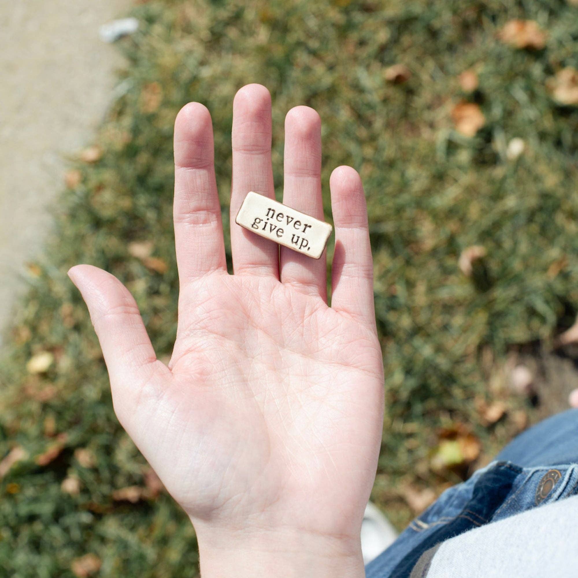 MudLOVE - Wholesale Keepsake Coin/Token - Never give up. Clay Pocket Rock Reminders1