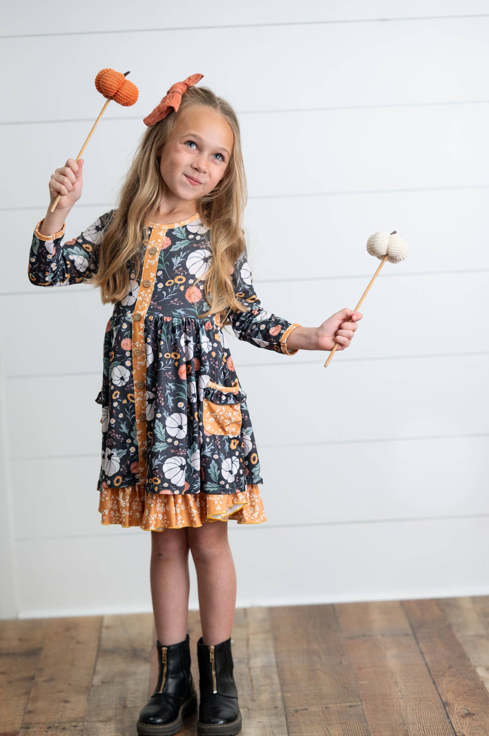 Oopsie Daisy - Wholesale Dress - Kids - Girls Mustard Pumpkin Ruffle Pocket Button Tie Fall Dress1