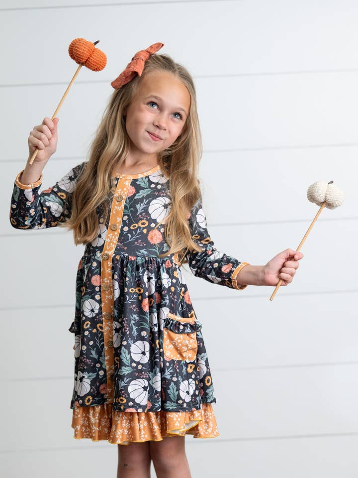 Oopsie Daisy - Wholesale Dress - Kids - Girls Mustard Pumpkin Ruffle Pocket Button Tie Fall Dress1