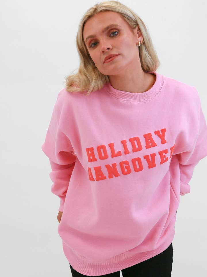 Pink Holiday Hangover Puff Sweatshirt for wholesale on Faire6