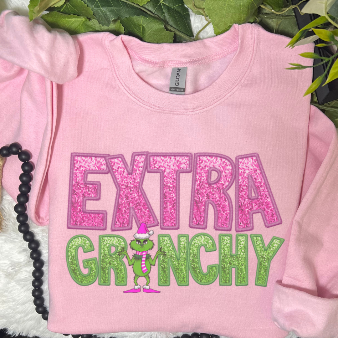 Glidan Pink Extra Grinchy Graphic Sweatshirt   for wholesale on Faire1