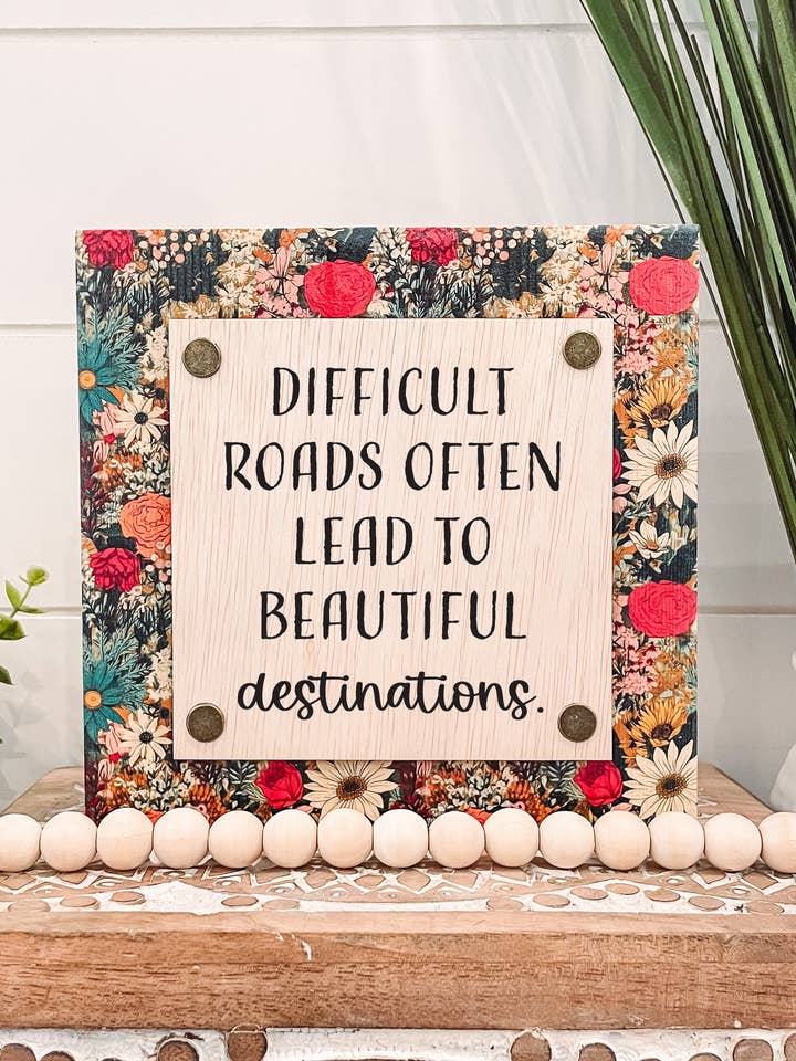 Difficult Roads Often Lead to Beautiful Destinations Sign for wholesale by Willie & Dolly Designs