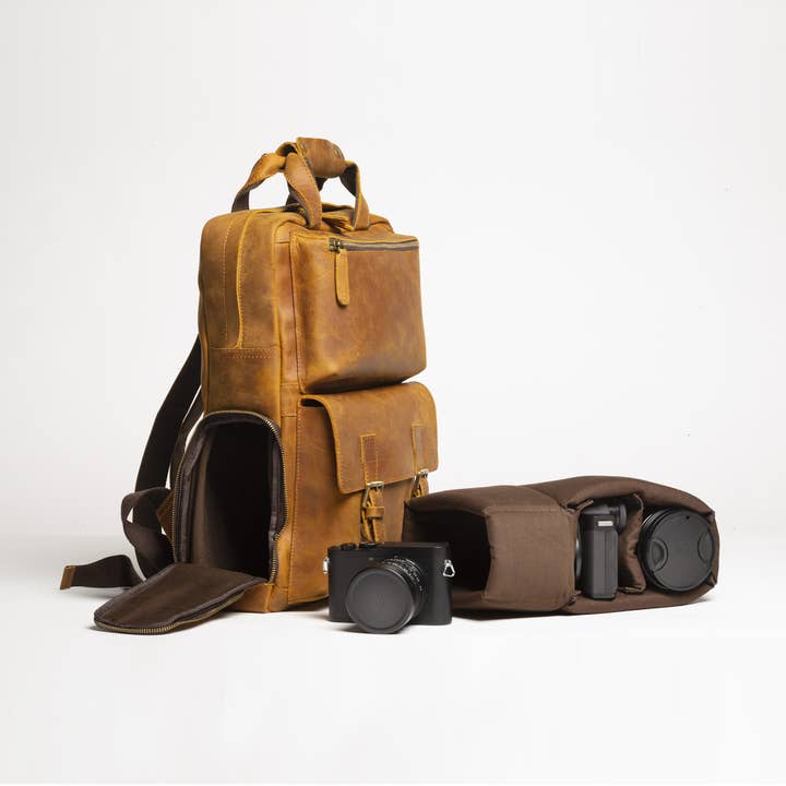 The MANN Bag | Large Capacity Leather Camera Backpack and other Purchase Wholesale camera equipment. Free Returns & Net 60 Terms on Faire trending on Faire.