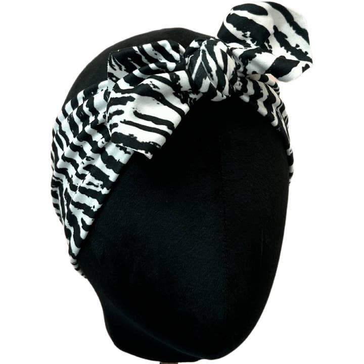 Bandeau à nœud supérieur imprimé zèbre pour la vente par The Sassy Olive Handmade Headbands