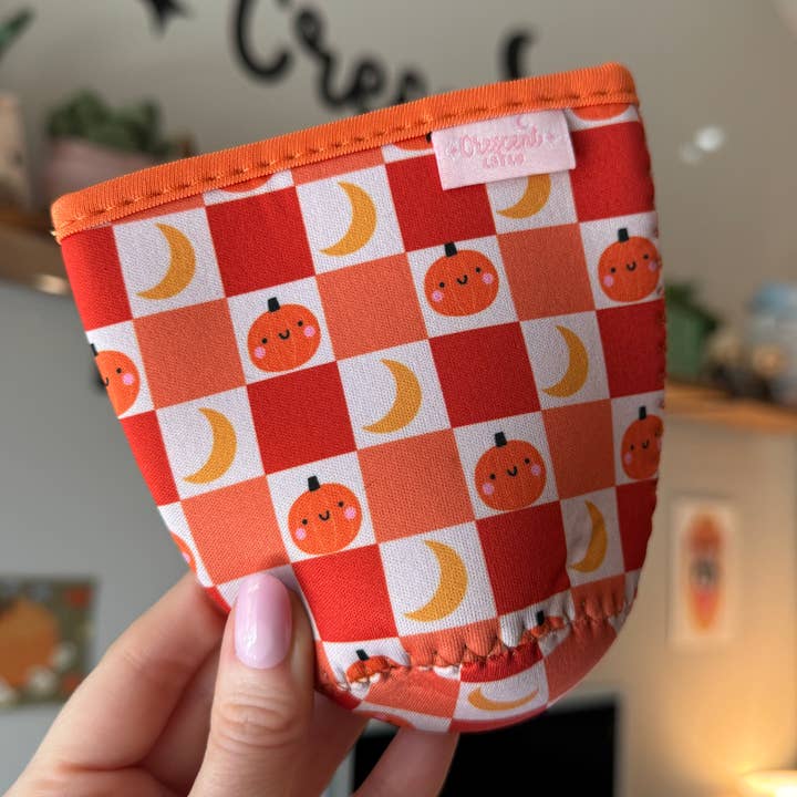 CrescentCatCo - Wholesale Drink Huggers & Koozies - Pumpkin Checkered Spooky Iced Coffee Drink Sleeve (Copy)2