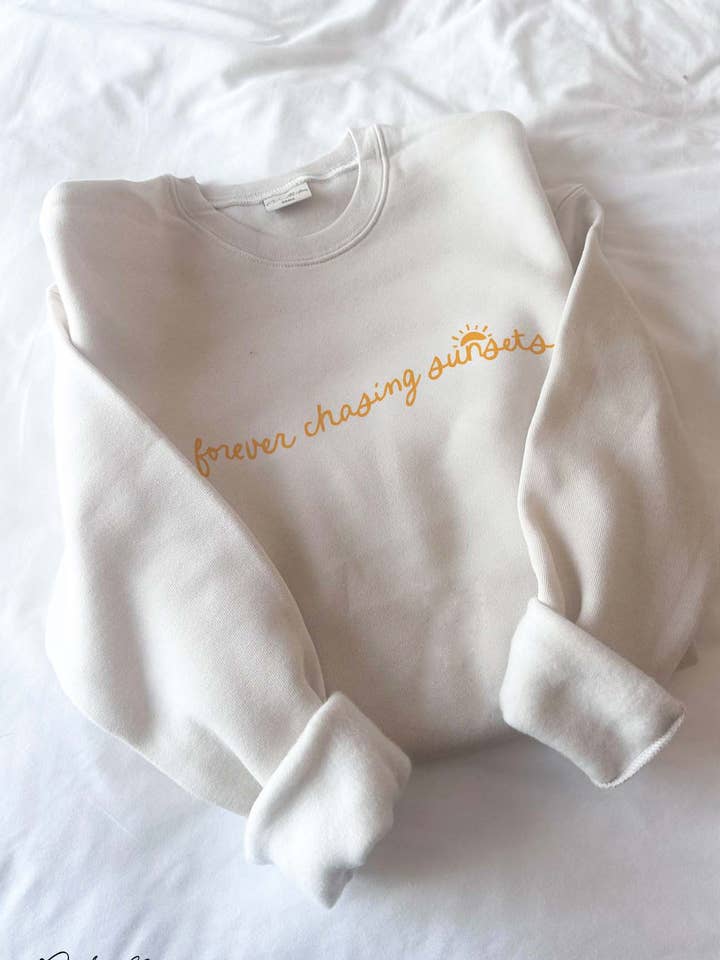 FOREVER CHASING SUNSETS Grafisk tröja för wholesale av OAT COLLECTIVE