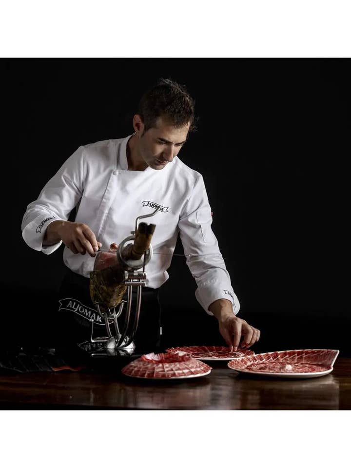 Iberische Bellota Hamkoffer 75% Raza Cut Mes voor wholesale door Jamones Aljomar