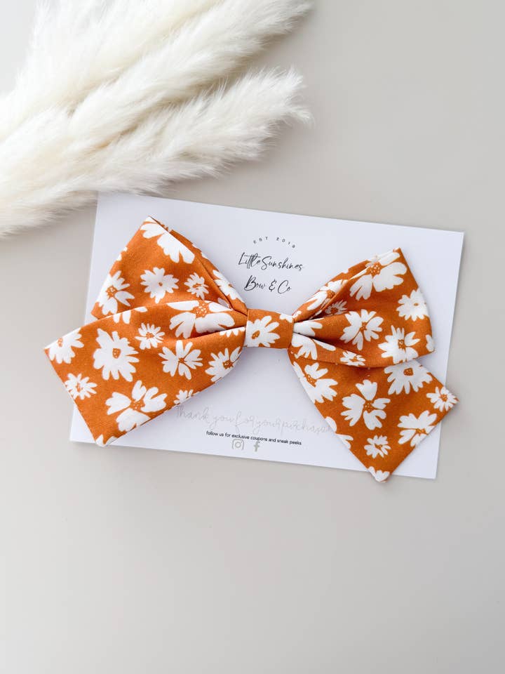 Orange Flowers Standard Size Pinwheel Hair Bow for wholesale by Little Sunshines Bow & Co