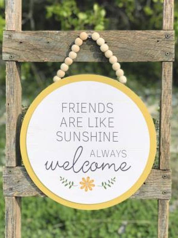 Friends Welcome Round Hanger for wholesale by DNS Designs