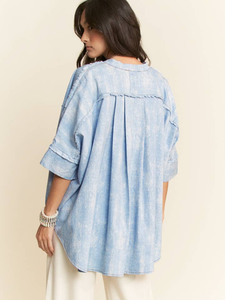 WASHED DENIM STAND COLLAR FRINGE HEM LOOSE SHIRT for wholesale on Faire4