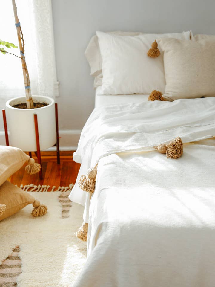 Moroccan Pom Pom Blanket - White with Beige Pom-poms for wholesale by Ouive