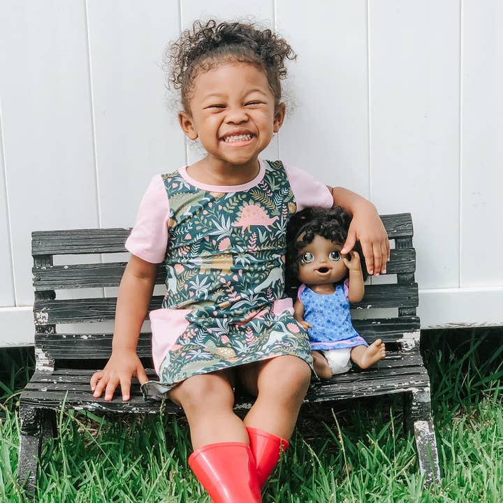 Dinosaur Pocket High Low T-shirt Dress for wholesale by Pearl & Fawn