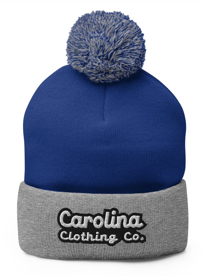 Brave logo Pom-Pom Beanie -2 color options for wholesale by Shop Carolina Clothing Co.