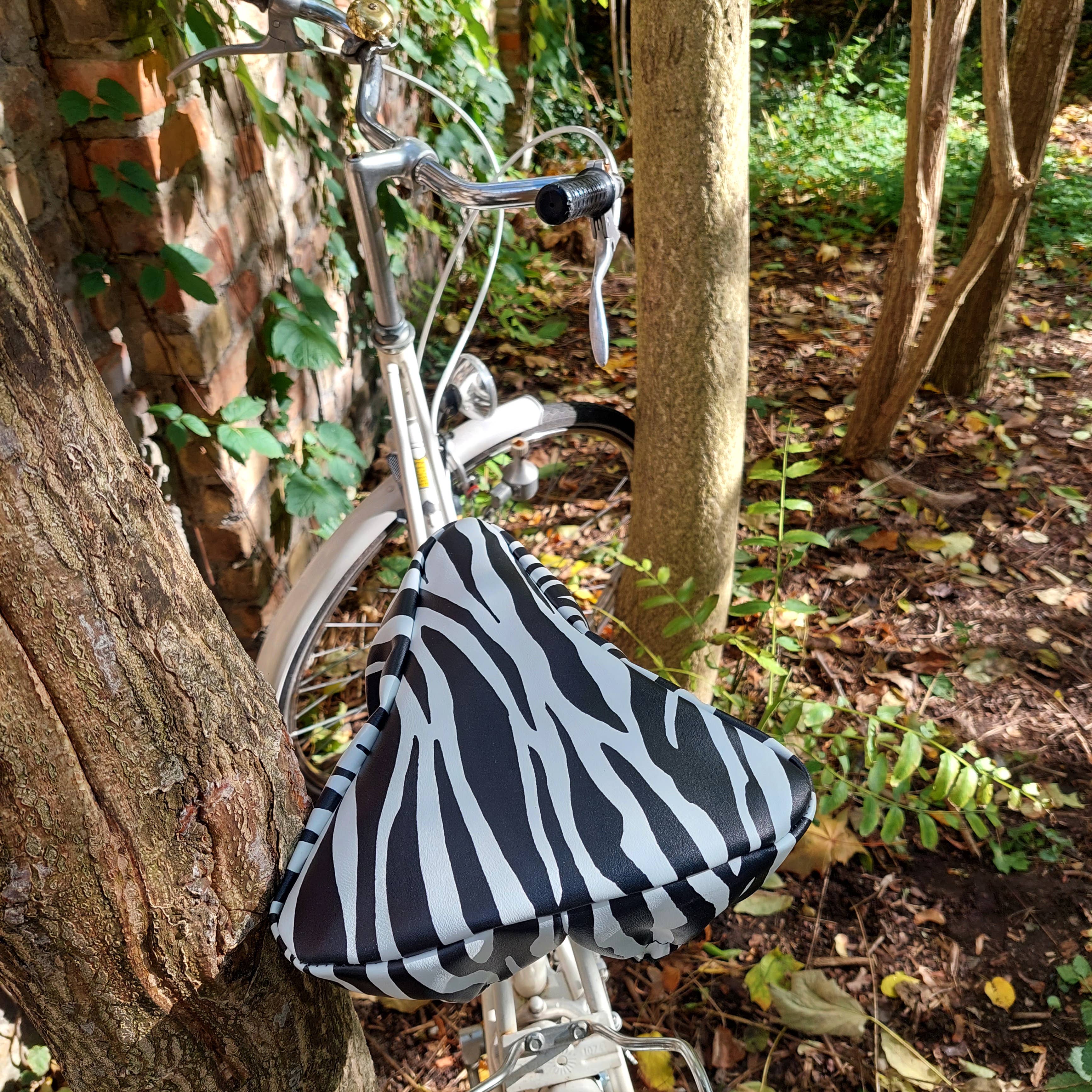 Ikuri – Großhandel Fahrradzubehör – Sattelbezug Regenschutz Fahrrad wasserdicht - Zebra3