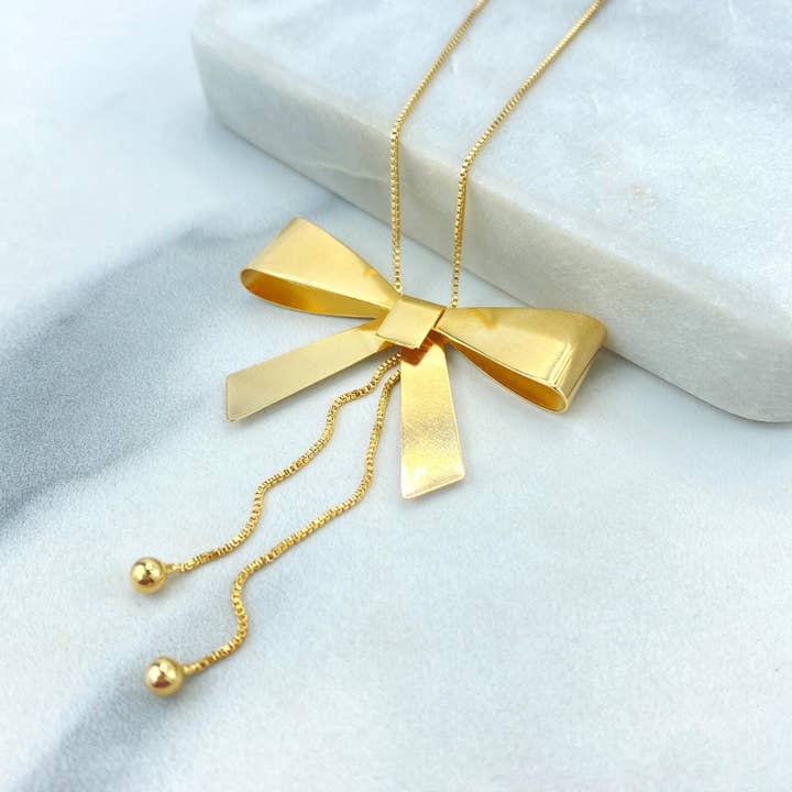 Collana orecchini a fiocco coquette in oro 18k, acquistabili come set o singolarmente. per la vendita all'ingrosso da parte di DIJU Jewelry