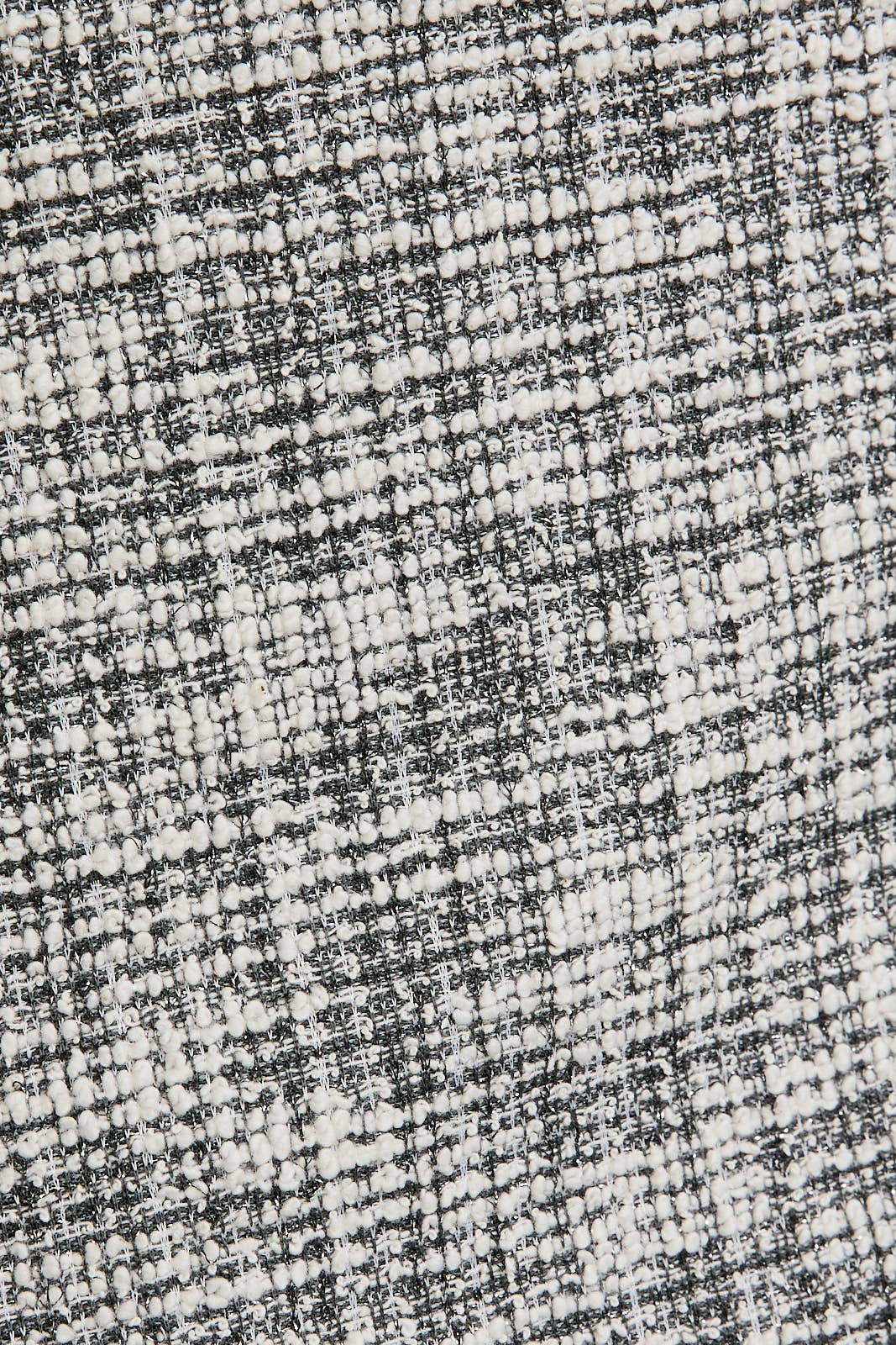 NOIR-BLANC HAUT SANS MANCHES EN TWEED À BOUTONS en vente sur Faire6