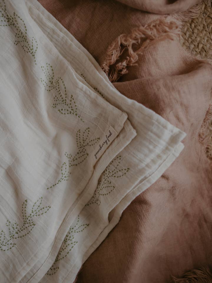 Large organic cotton embroidered muslin swaddle for wholesale by Gooseberry fool