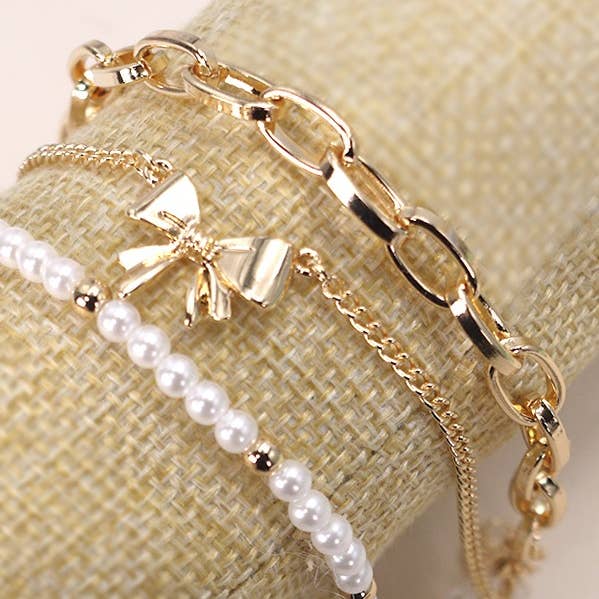 GOLD BOW PEARL LINK TRIO SET BRACELETS | 80B146 for wholesale on Faire