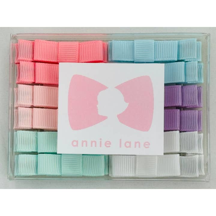 Boîte de 12 nœuds pour cheveux - paires unies 1 pour la vente par Annie Lane