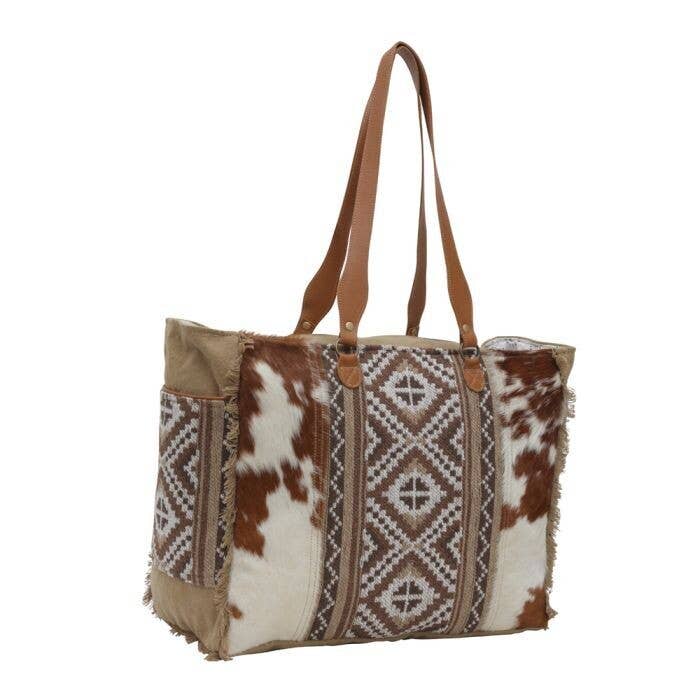 myra cowhide weekender bag