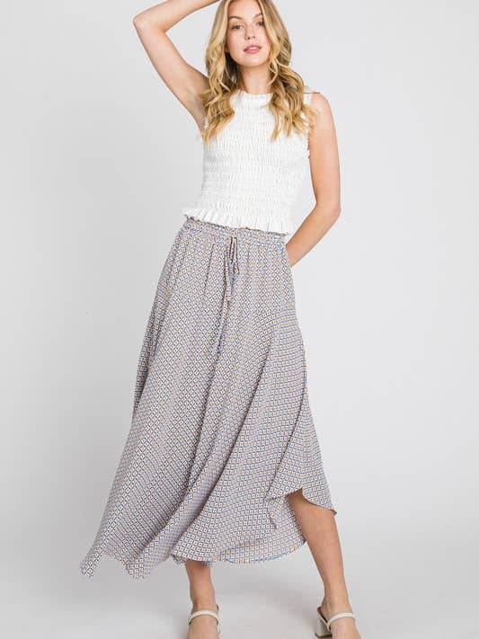 JUPE ÉVASÉE OURLET COURBE AVEC CORDON DE SERRAGE -FS80201 pour la vente par Calista