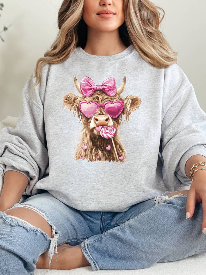 Heart Sunnies Highland Cow Sweatshirt for wholesale by CMD Wholesale