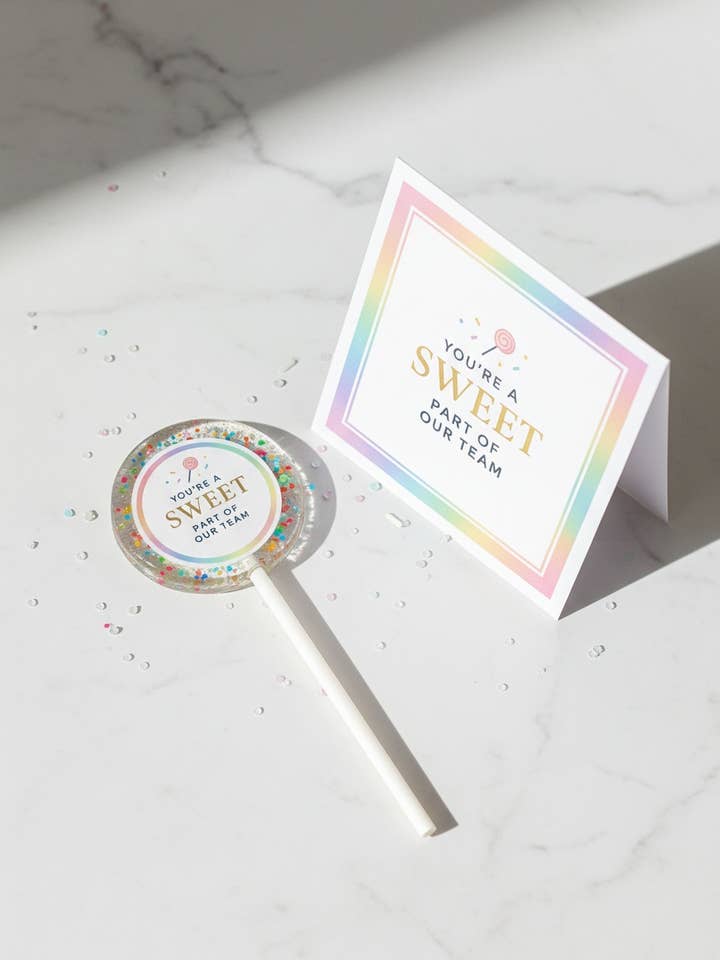 Arbejdspladsens værdsættelses-slikkepinde – Medarbejderværdsættelse for engroshandel hos TheLollipopStudio