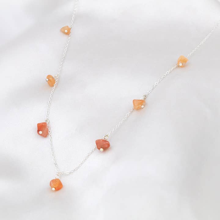 Dainty Carnelian necklace with raw crystal beads for wholesale by Allie and Posie