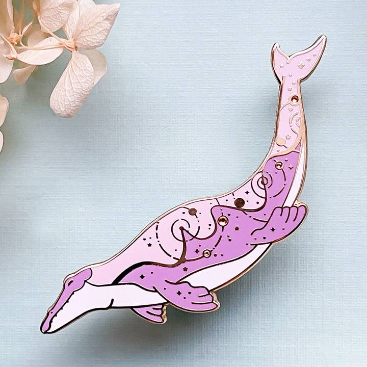 Ancient Dorudon Gravitational Singularity Enamel Pin for wholesale by Alum and Ink