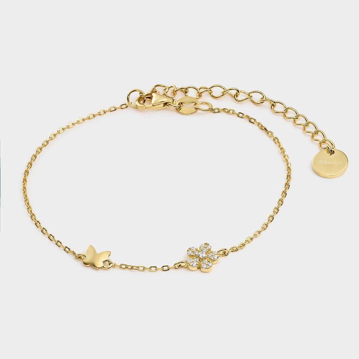 Yellow gold plated silver bracelet with butterfly and flower motif with white zircons for wholesale by Itemporality