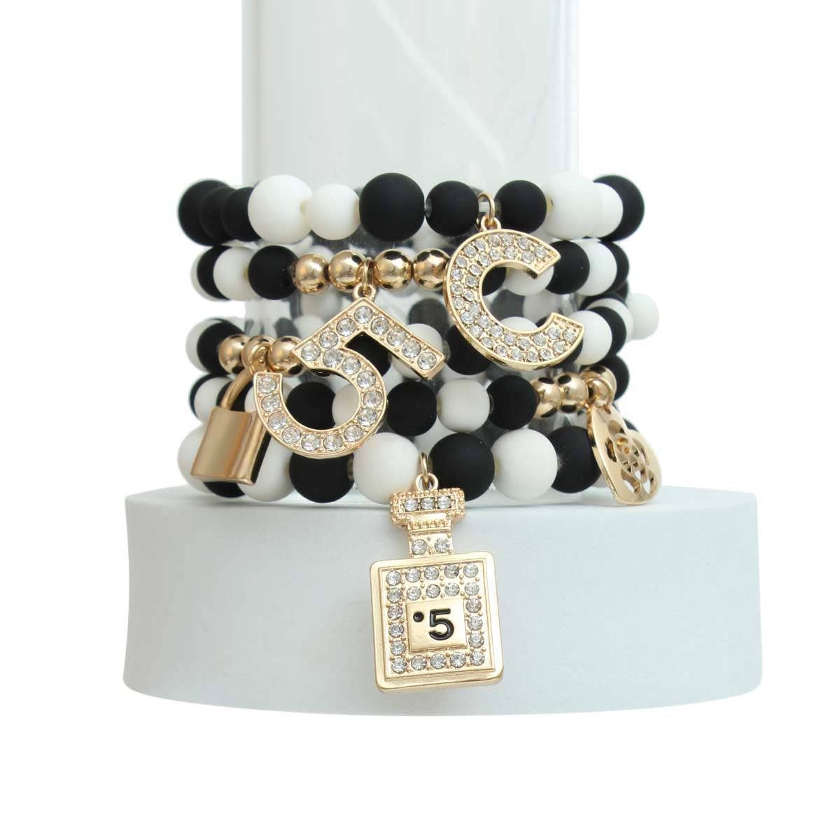 Matte Black and White Boutique Charm Bracelets for wholesale on Faire1