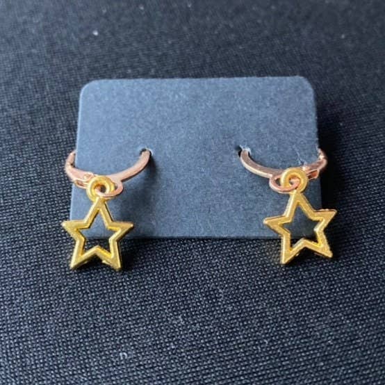 Orecchini pendenti a forma di stella per la vendita all'ingrosso da parte di Mystical Rings