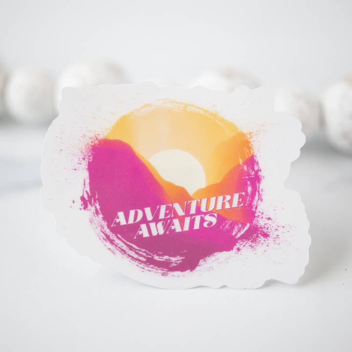 Savannah and James Co - Wholesale Sticker - Adventure Awaits, Sunset Clear Vinyl Sticker, 3in.2